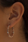 Hoop earrings with oval cut stones in multicolour design