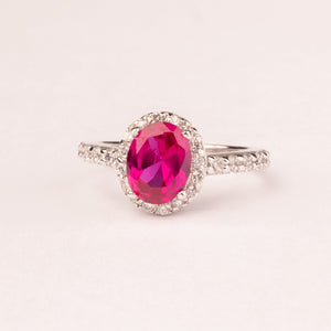 Oval ruby zirconia ring with micro zirconia.