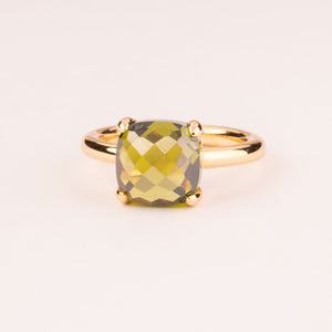 Colourful ring with olive green cushion-cut zircons