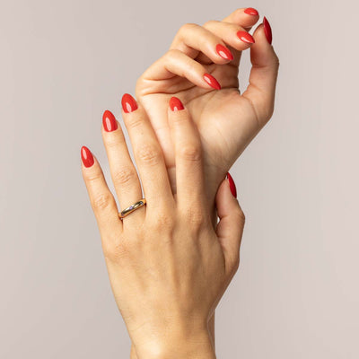 Plain ring with colored zircons