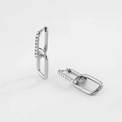 Double intertwined hoop earrings with zircons