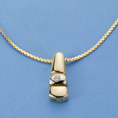 18K Yellow Gold Brilliant Pendant 16x6 mm 0.05 Qts. Chain 42