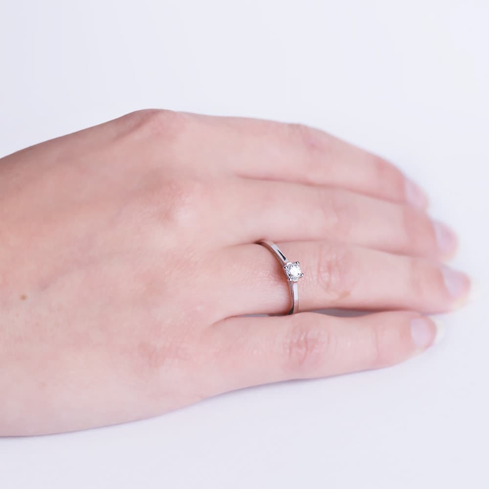 Solitaire diamant 18K taille brillant or blanc 0,150 Qts. Si-H