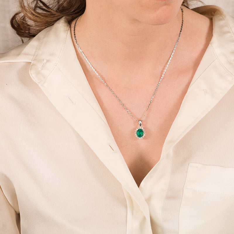 18K White Gold Pendant Emerald 1.74 Qts. Si-H Diamonds 0.42 Qte