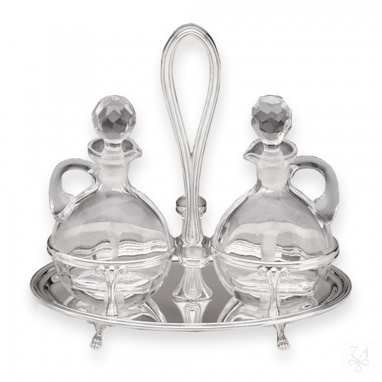 Aceitera y vinagrera modelo Inglés oval de plata de ley 925 con patas y botellas de cristal