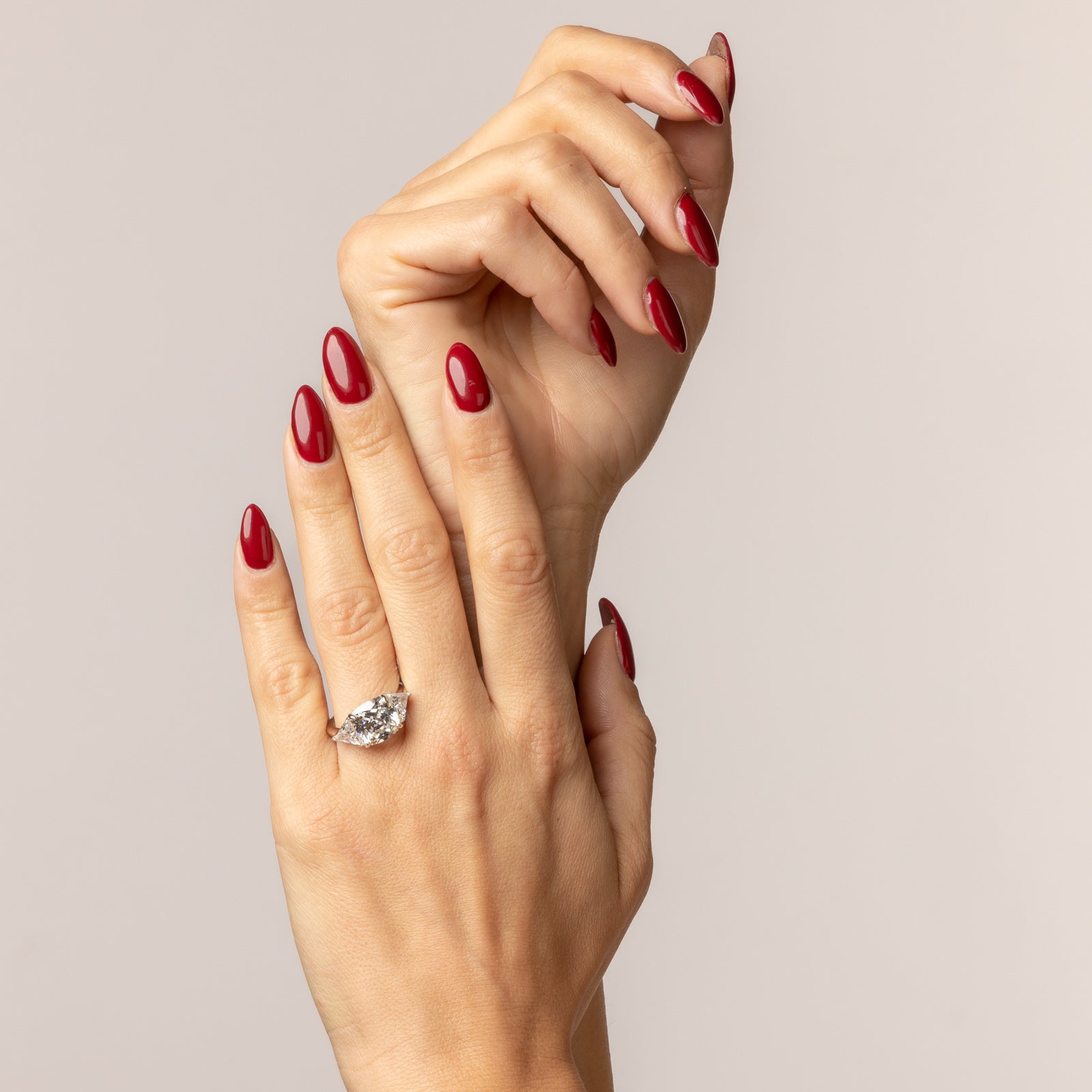 Square ring with white cubic zirconia and triangles