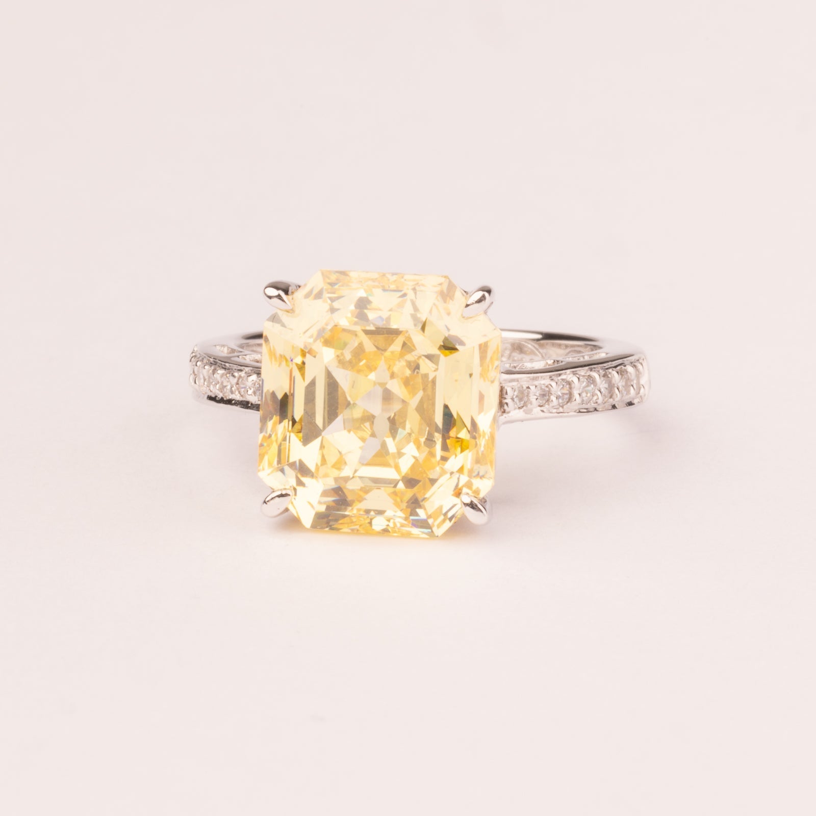 High quality emerald cut topaz solitaire