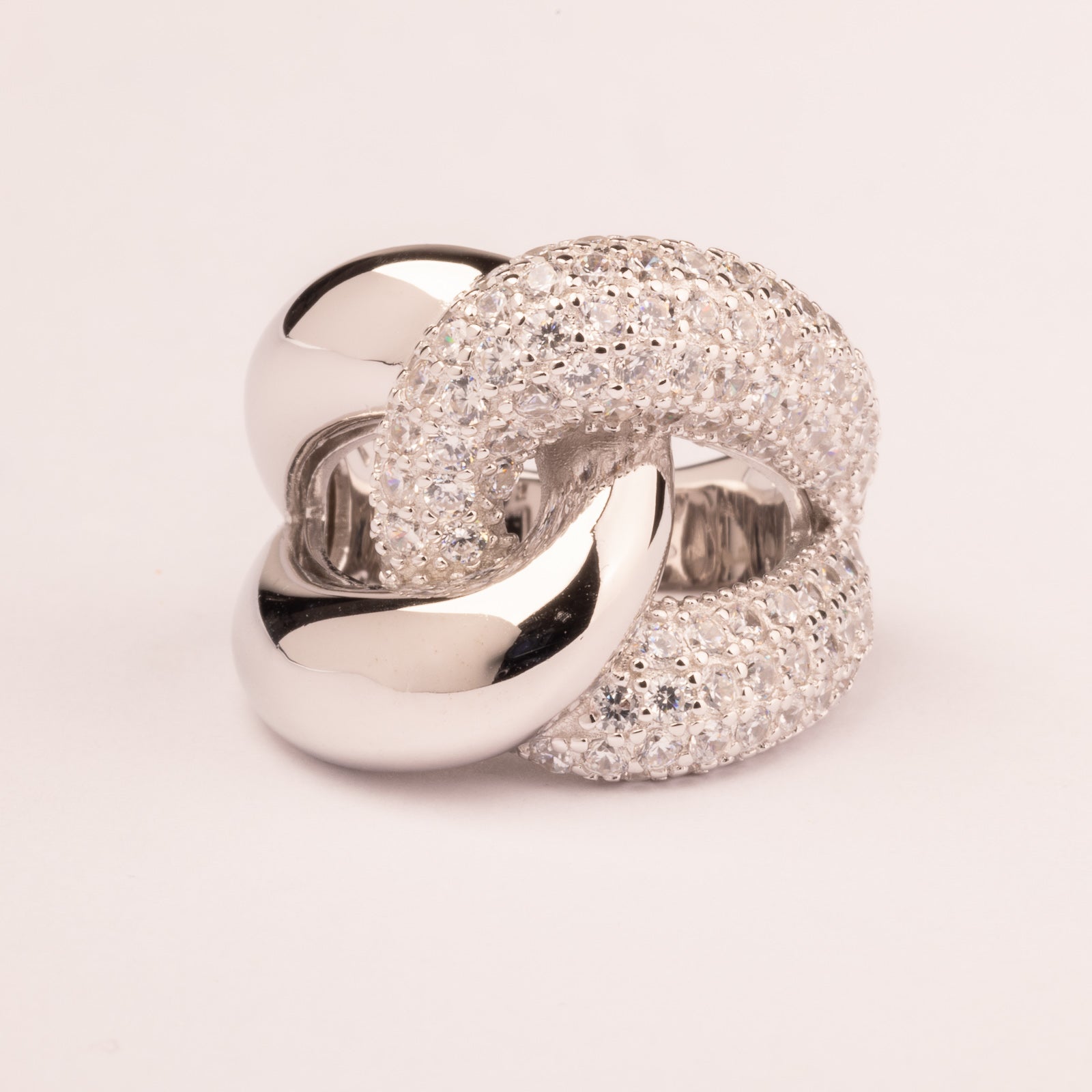 Knot ring with cubic zirconia