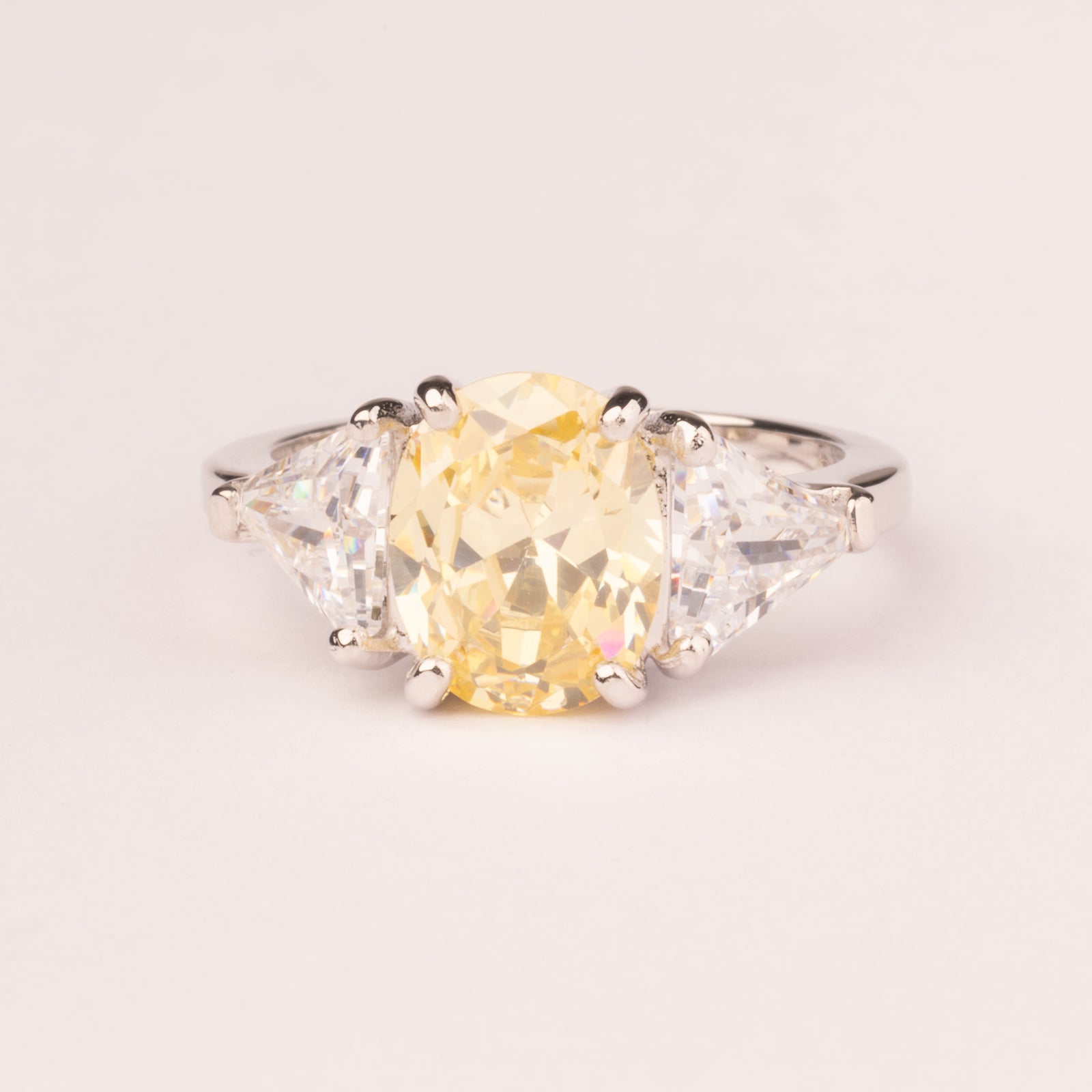 Small ring with oval topaz cubic zirconia