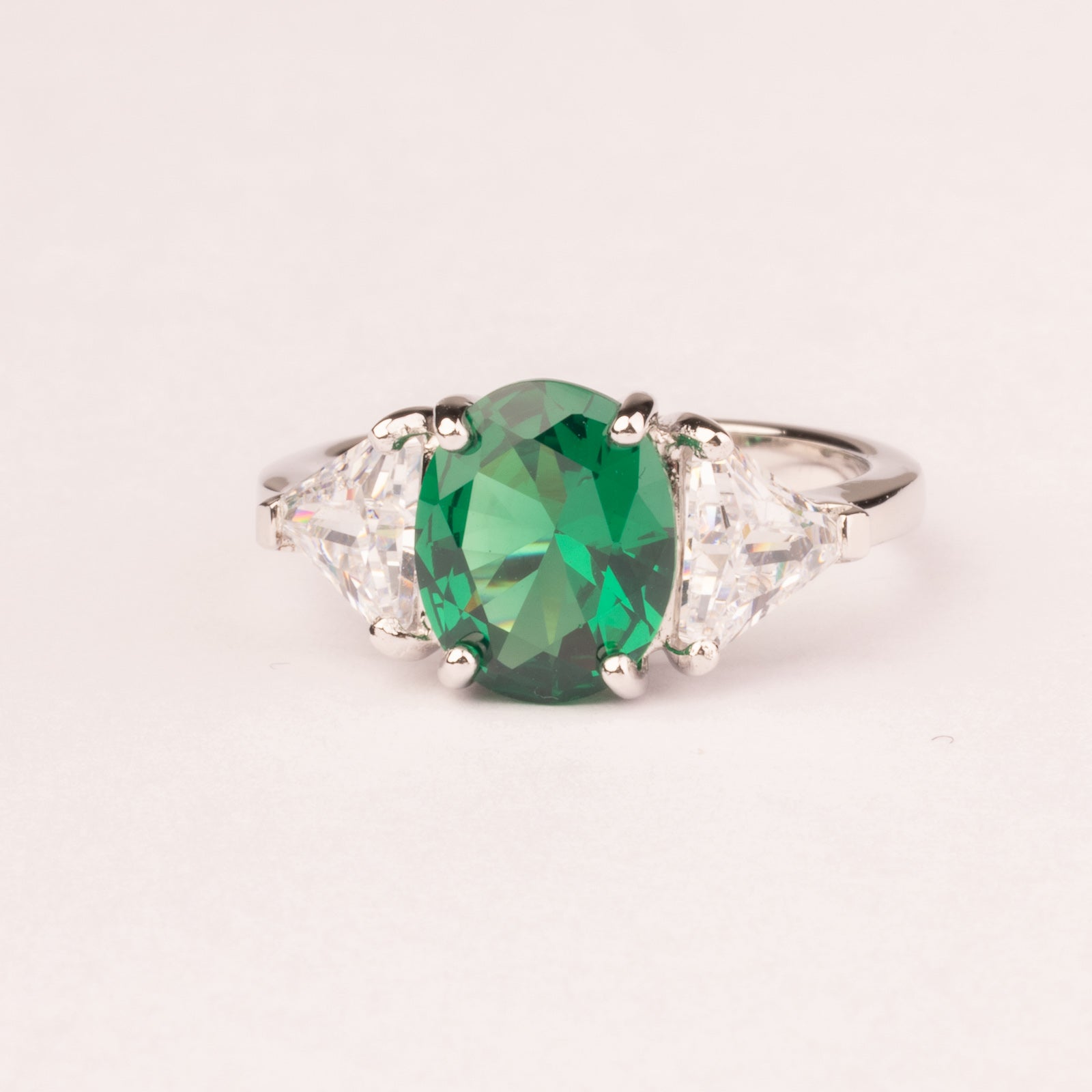 Small ring with oval emerald cubic zirconia
