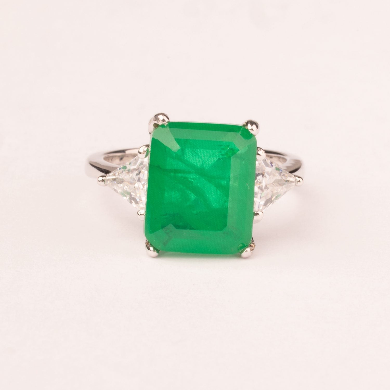 Ring with emerald-cut emerald cubic zirconia