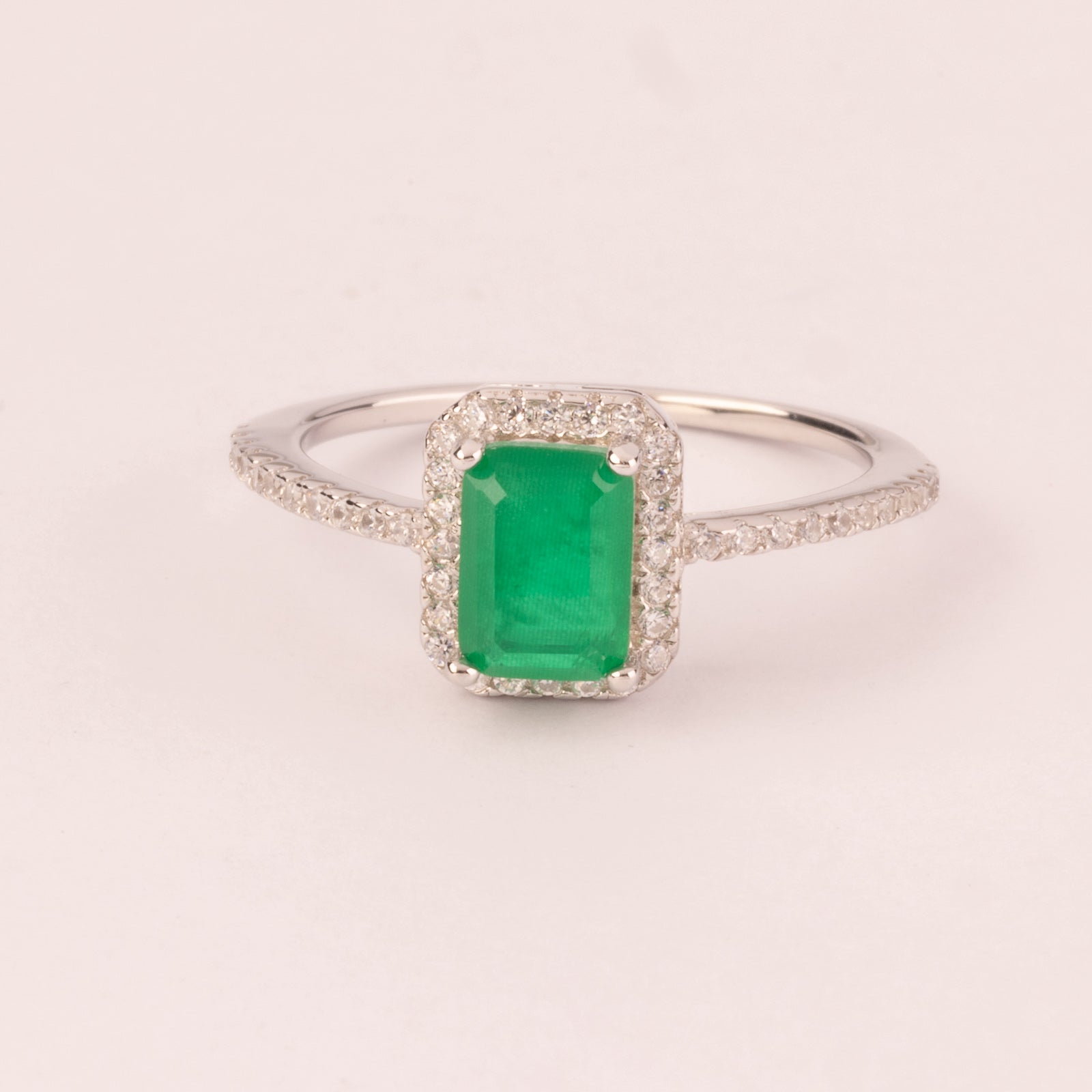 Rectangular ring with emerald cubic zirconia and micro cubic zirconias