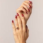 Colorful ring with blue cushion-cut zircons