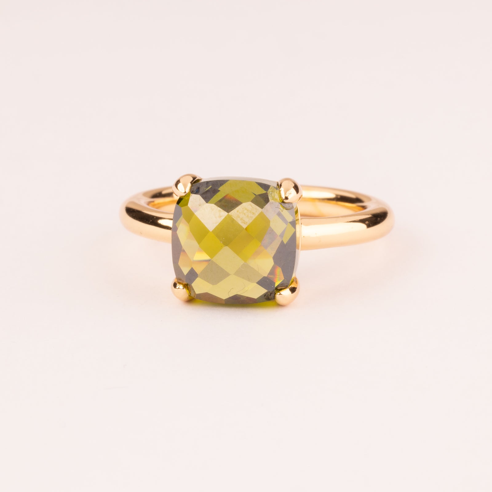 Colorful ring with cushion-cut olive green cubic zirconia