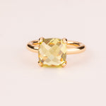 Colorful ring with cushion-cut peridot zircons