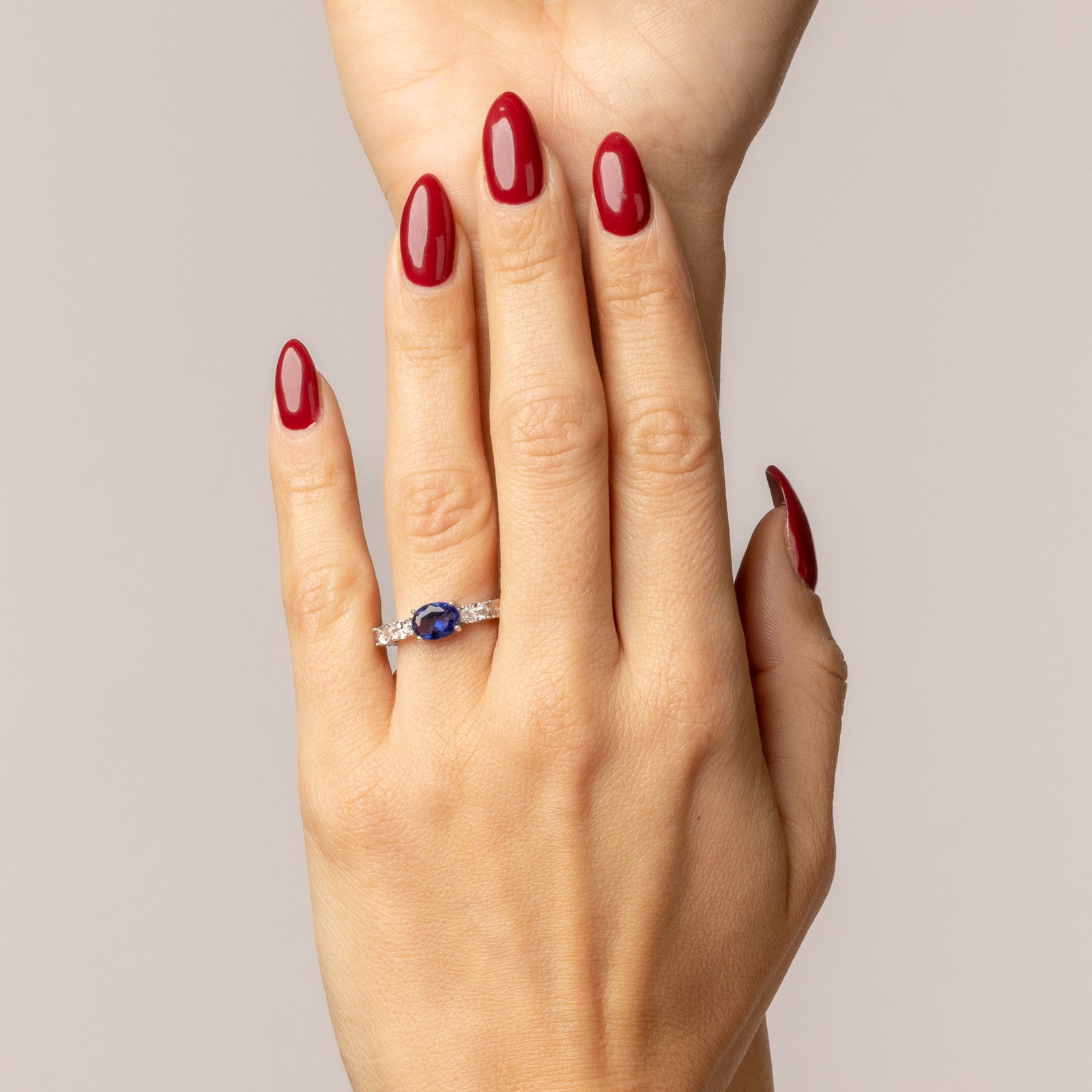 Alliance with oval sapphire cubic zirconia