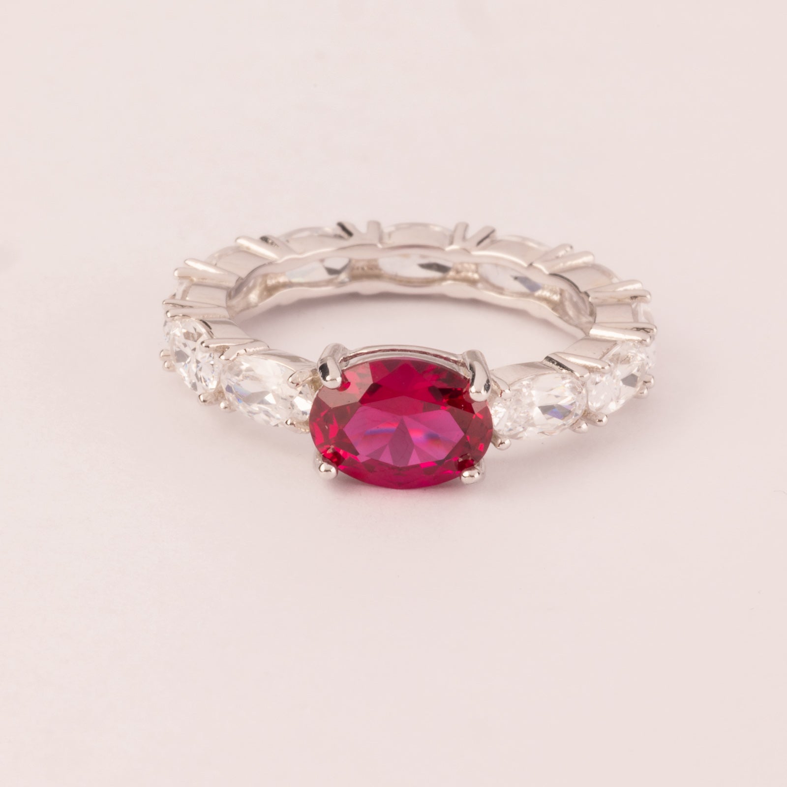 Alliance with oval ruby cubic zirconia