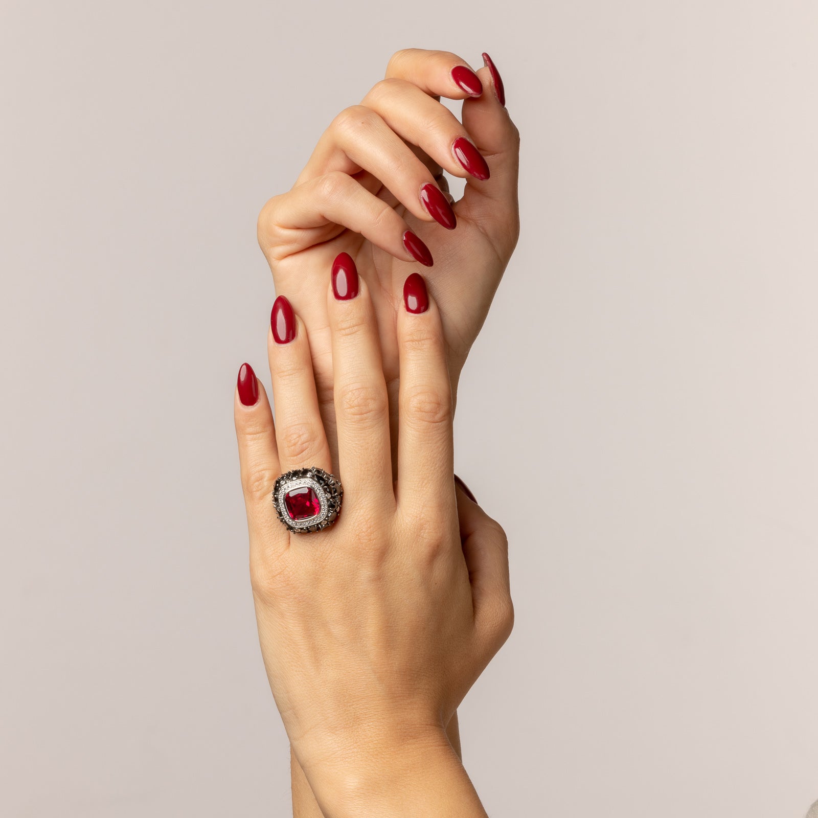 Rounded pavé rose ring with contrasting central stone