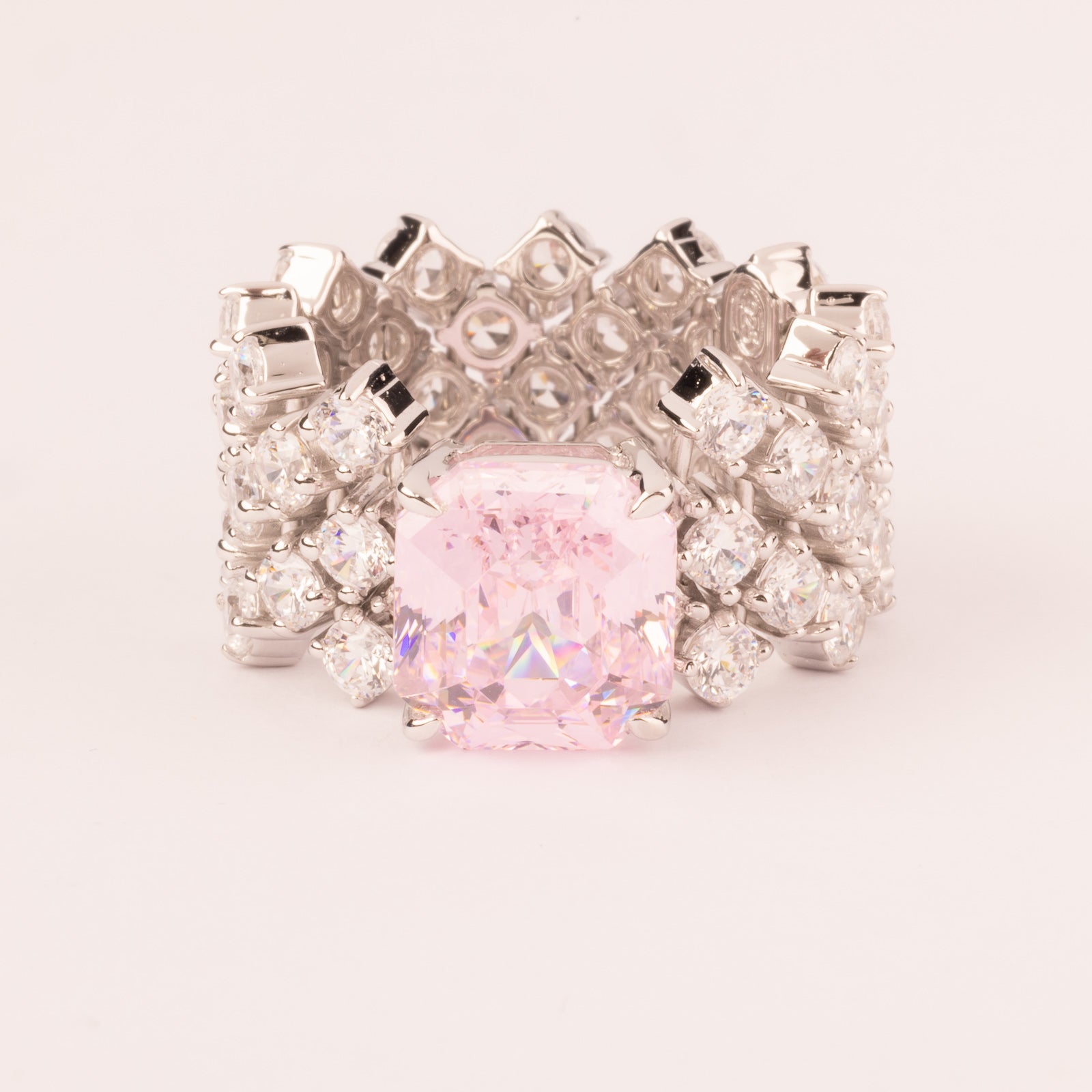 High and soft mesh with central pink zirconia with emerald cut