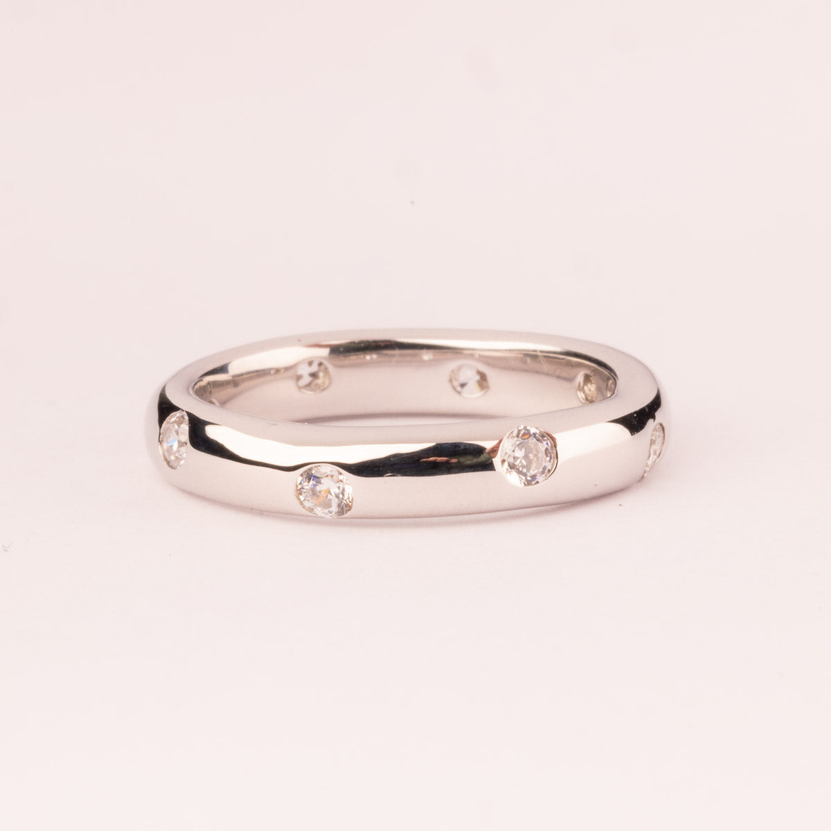 Smooth ring with white cubic zirconia