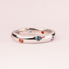 Plain ring with colored zircons