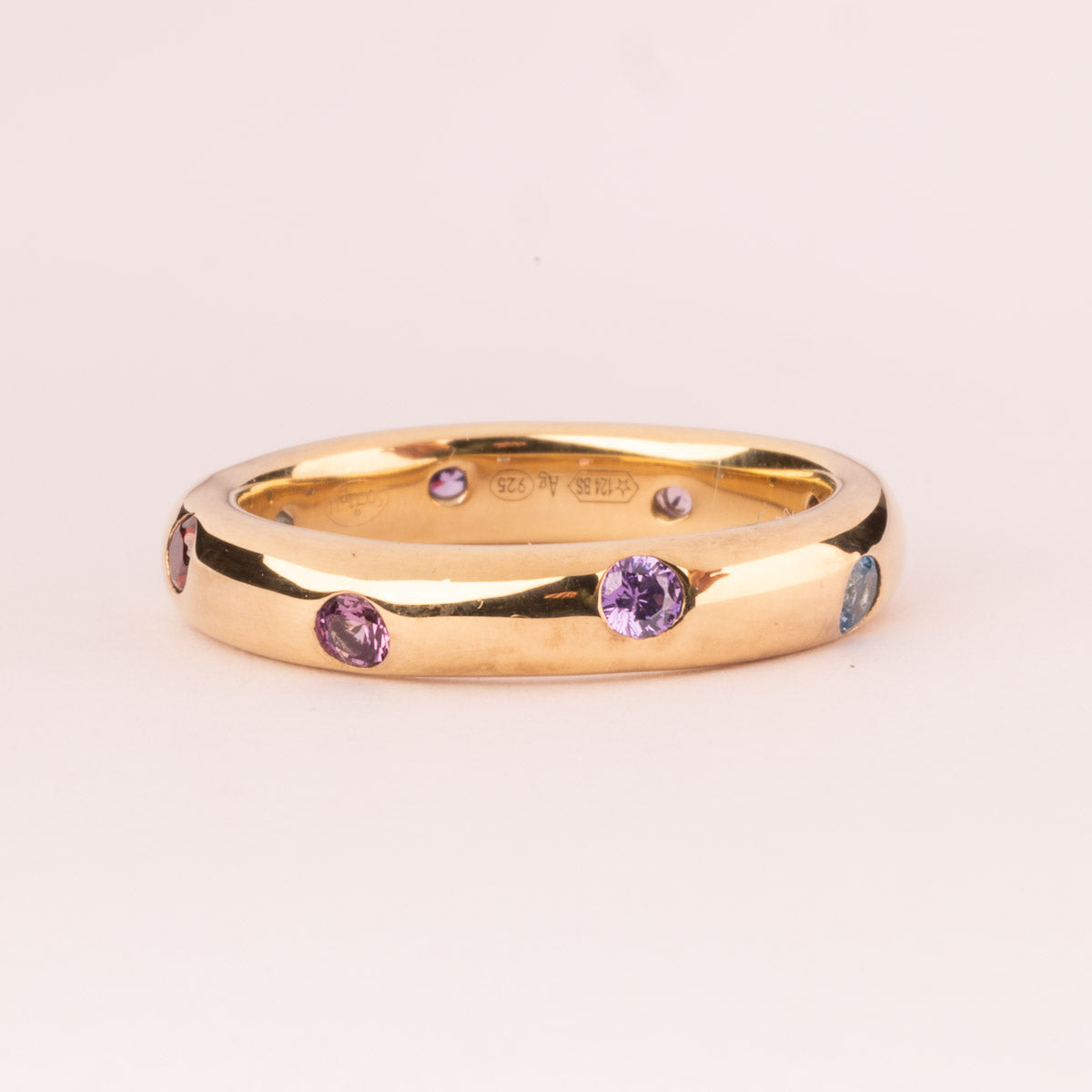 Smooth ring with colored cubic zirconia plated in 18k gold