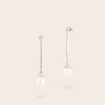 Boucles d'oreilles longues et fines perles