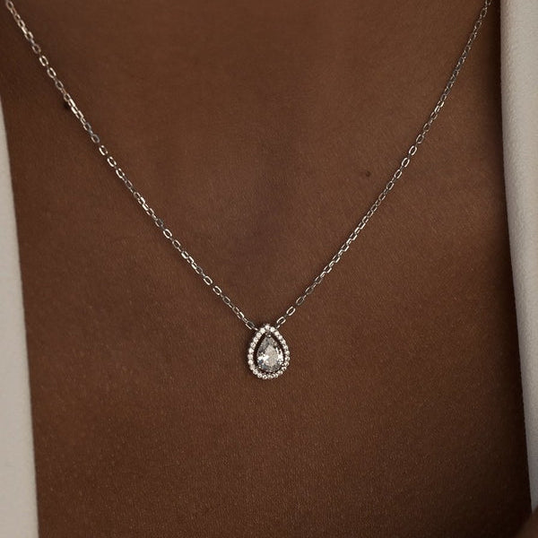 Brilliant Silver Pendant with Teardrop-Shaped Adamantine Quartz Motif and Zirconia Detail