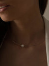 Pearl pendant in silver rigid design 