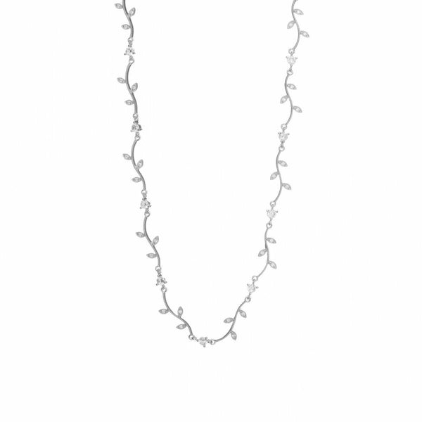 Party necklaces with curvilinear floral design and zirconia