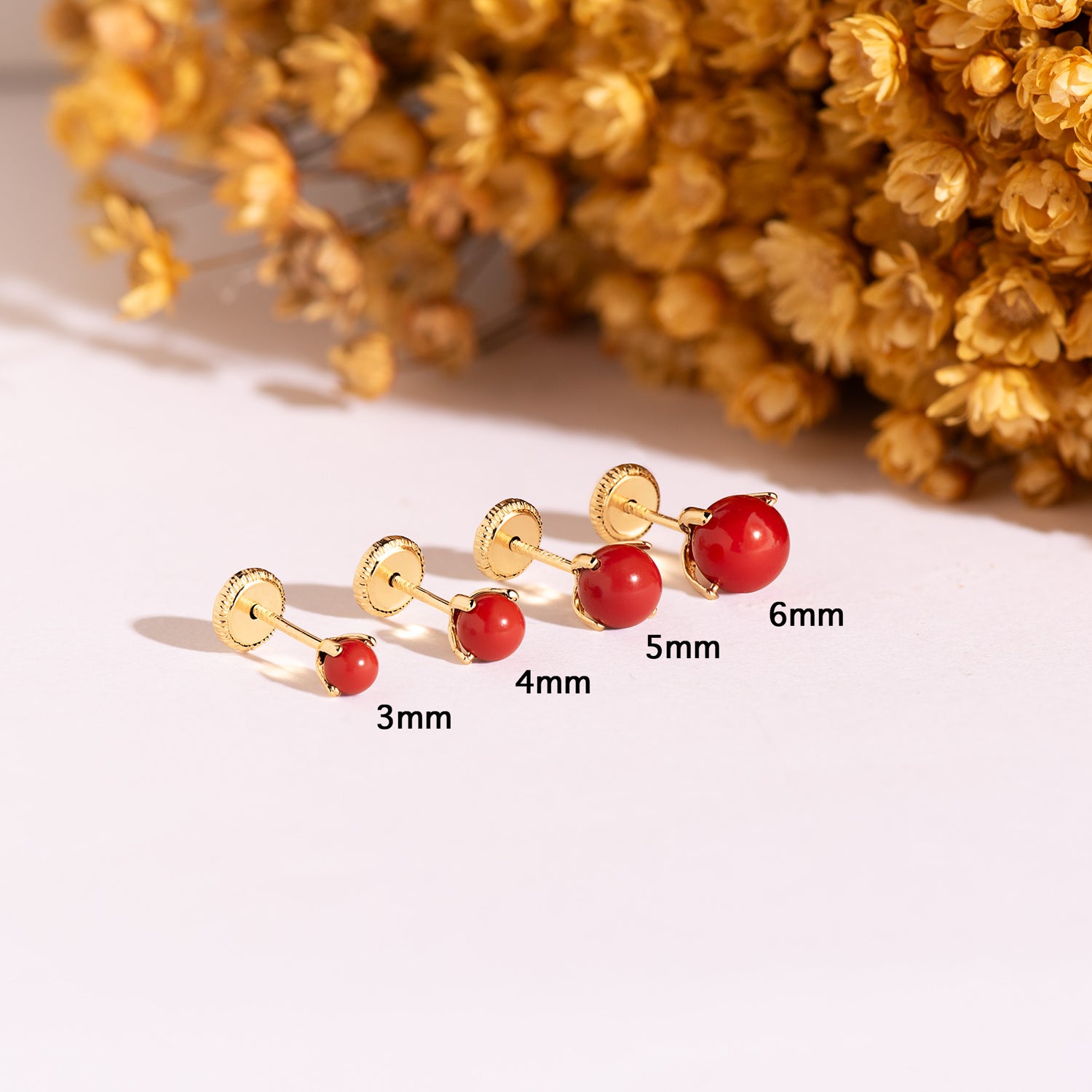 18K Yellow Gold Earrings 4 Prongs 3mm Coral. Nut Closure