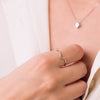 18K White Gold Ring 7 Diamonds 0.035 Qts. G-Vs2. Round Body 1 mm