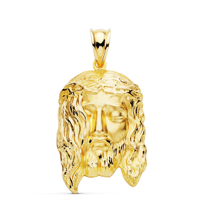 Pendentif Tête de Christ estampillé en or jaune 18 carats. 30x19mm