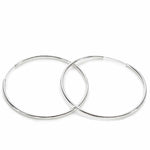 Large hoop earrings with smooth silver tubular design and hidden clasp 60 mm