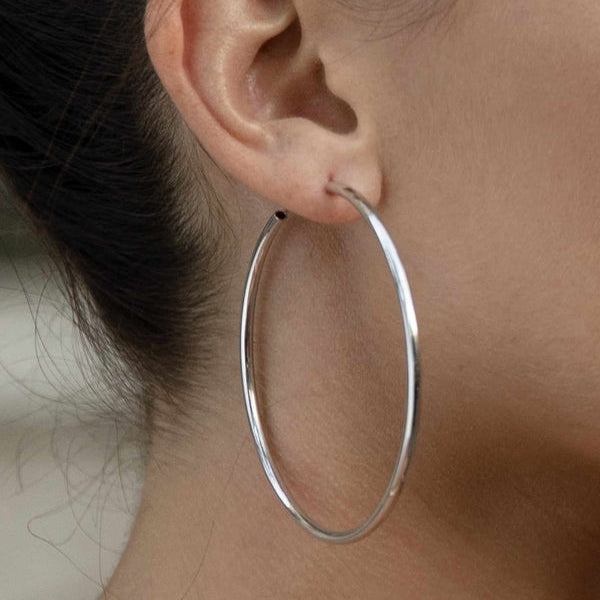 Large hoop earrings tubular design of smooth silver and hidden clasp 60 mm