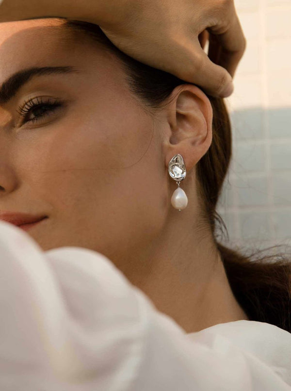 Boucles d'oreilles pendentif perle design liquide irrégulier