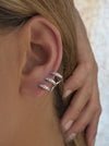 Boucles d'oreilles design originales à trois griffes avec zircons