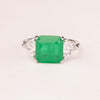 Square emerald ring with triangular zirconia