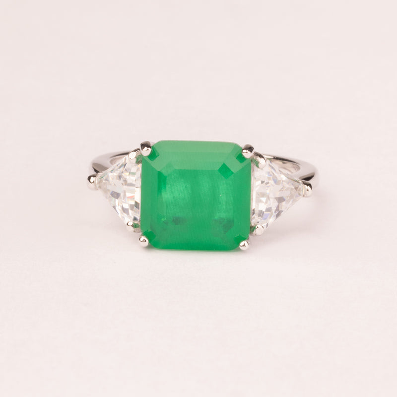 Square emerald ring with triangular zirconia