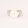 Stem ring with brilliant cut zircons and shell pearls