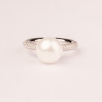 Round cane ring with zircons and shell pearl