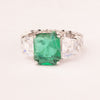 Baguette ring with rectangular emerald solitaire