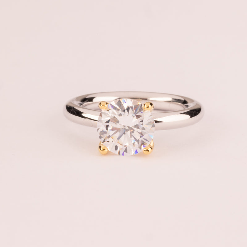 Smooth stem solitaire with 9 mm zirconia plated in 18k gold