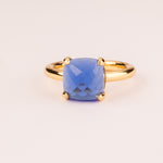 Colorful ring with blue cushion-cut zircons