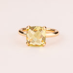 Colorful ring with peridot cushion-cut zircons