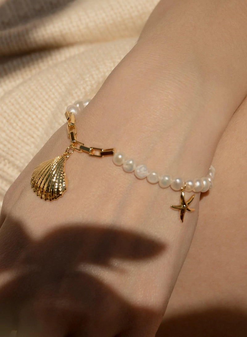ideología Haz un experimento Muchos Pulseras de Perlas en Oro Diseño Charms de Concha y Estrella de Mar –  Sanchis Salcedo