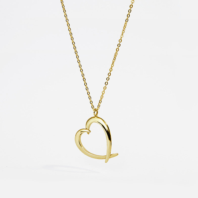 Gold Tusk Heart Chain