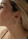 Boucles d'oreilles créoles avec pierres dans des tons bleu argenté