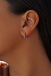 Boucles d'oreilles créoles en argent avec zircons multicolores