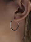 Boucles d'oreilles créoles en argent avec motif zircon blanc